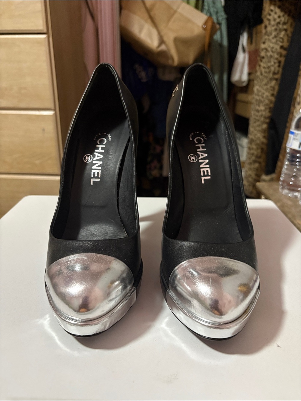 CHANEL Black Pumps with Silver Cap Toe